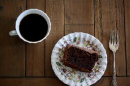 Slice of gluten-free oat flour chocolate cake.