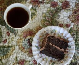 Gluten-free chocolate layer cake and coffee.