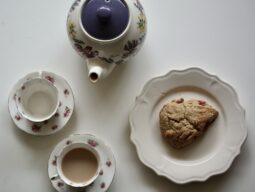 Gluten-free cranberry-orange scones and a pot of tea.